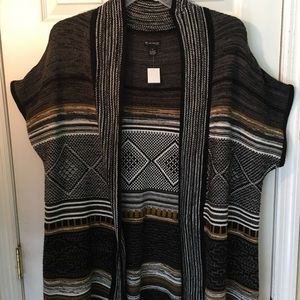 Poncho type vest